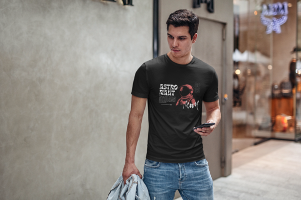 Model wearing Astronaut T-Shirt, Brand Name - Thread Wair Cosmic Voyage Men's T-Shirt